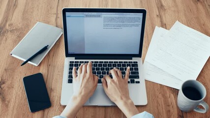 Poster - A person is focused on typing on a laptop, surrounded by papers and a coffee cup on a wooden desk, indicating a productive work session in a cozy environment.