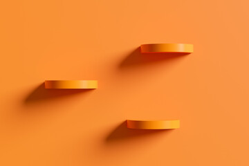 Aufkleber - Three orange shelves creating shadows on orange wall