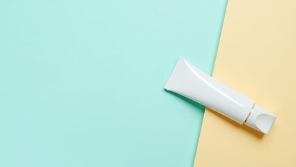 Poster - Skin Barrier Repair. Healing skin repair. Isolated background, copyspace.. Tube of cream brings hope for healing on soothing pasty blue and yellow background surface.