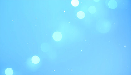 Wall Mural - Soft blue bokeh with glittering light particles creates magical and dreamy atmosphere, perfect for backgrounds or artistic projects. subtle star flares enhance enchanting effect