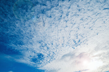 Wall Mural - blue sky scene, picturesque blue sky background with scenic fluffy clouds