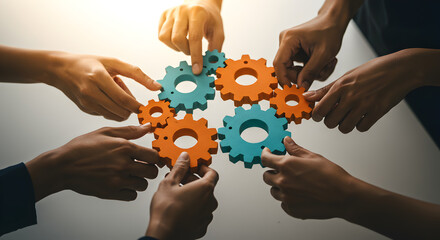 Poster - Multiple Hands Assembling Blue and Orange Gear Wheels Symbolizing Teamwork Collaboration and Mechanical Precision