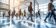 © Molly P - Office lobby or public space with large glass windows and numerous people walking through. The long exposure photography creates a blur effect of business people walking at modern workplace. AIG55.