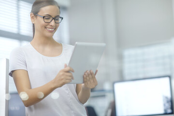 Leinwandbilder - Office, business woman and research with tablet for project, online website and working with smile. Female receptionist, reading and planning for human resource, administration and tasks with tech