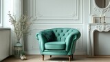 Stylish green armchair in a living room with white wall decor and rococo details -