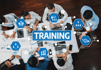 Poster - Dynamic training session showcasing collaboration among professionals. Focus on skills, knowledge sharing, e-learning, and innovative strategies for professional development. Amity