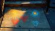 © stasja - Colorful chalk drawings of suns and hearts on sidewalk steps in urban setting during golden hour