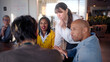 © CarlosBarquero - Professional businesswoman leading collaborative team meeting, diverse colleagues engaging in strategic brainstorming and sharing innovative ideas within modern office environment