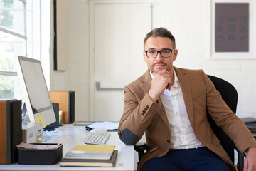 Fototapete - Portrait, pride and man in office, startup and creativity for project, graphic designer and copywriting. Face, person and entrepreneur in workplace, career ambition and pc with editor and freelancer