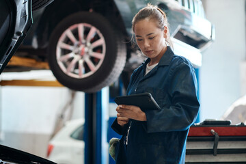 Poster - Tablet, checklist and woman in workshop with car service, maintenance or online motor insurance. Tech, engine and female mechanic in garage on digital app for inspection, repair and quality assurance