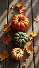 Poster - Autumn Still Life: Pumpkins and Maple Leaves on Rustic Wooden Boards in Warm Sunlight