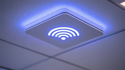 Poster - Modern Wireless Access Point Mounted on Ceiling with Blue Indicator Light for Enhanced Connectivity and Internet Access 4k video