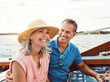 © BuyoutReese08/peopleimages.com - Happy couple, ocean adventure and together in yacht on holiday, relax on cruise date for retirement travel. Mature, woman and man on water boat for vacation with happiness, outdoor summer in Bali