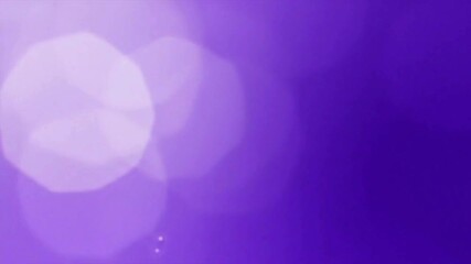 Purple bokeh effect with blurred circles and soft light, abstract design