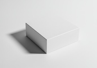 Poster - A simple white cube casting a soft shadow on a white surface, showing minimalist design and clean presentation
