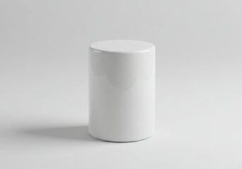 Poster - Simple still life of a white cylinder object on a white surface with soft lighting