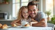 © Nathan - Smiling Caucasian father and daughter enjoying breakfast together with pastries and hot drinks in a cozy kitchen.