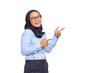 © Sewupari Studio - Portrait of smiling young Asian woman pointing finger at copy space isolated on transparent background