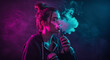 © diditlagi - Young Woman Exhaling Vapor In Neon Purple And Blue Studio Lighting