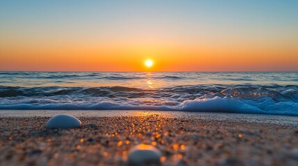 Poster - Serene sunset over calm ocean waves gently lapping a sandy beach, with smooth stones in the foreground, reflecting the warm golden light. : Generative AI