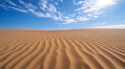 Poster - Expansive desert landscape under a vibrant blue sky, showcasing the rhythmic patterns of wind-swept sand dunes stretching to the horizon. : Generative AI