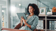 © peopleimages.com - Business, african woman and tablet in office with internet connection for accounting, communication or email. Employee, person and technology for finances, accounts and online payroll review