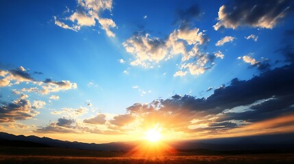 Poster - Majestic sunset over a vast golden field, silhouetted mountains on the horizon, vibrant orange and blue hues paint the sky with fluffy clouds. : Generative AI