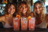 Friends enjoy making homemade cocktails together during a lively evening gathering