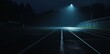 © Wicha1 - dramatic night shot of an empty running track with only a single spotlight illuminating the lanes