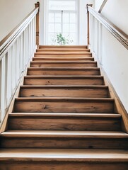 Poster - Wooden staircase ascending towards a bright window, showcasing aged wood texture and white painted banister. : Generative AI