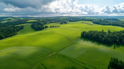 Aufkleber - Aerial view of rolling green hills, farmland, and forests under a partly cloudy sky.  A picturesque landscape showcasing the beauty of nature's patterns. : Generative AI