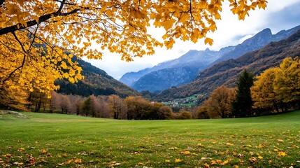 Poster - Autumnal landscape showcasing a vibrant valley nestled between majestic mountains, with golden maple leaves framing the scene and scattered across a lush green meadow. : Generative AI