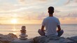 © Generative AI - Serene man meditating on rocks at sunset, ocean view, balanced stones nearby, peaceful atmosphere, tranquil scene, back view, yoga, mindfulness, spiritual practice. : Generative AI