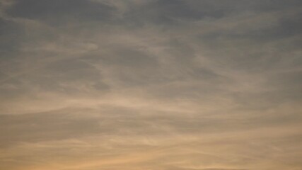 Poster - As daylight fades, clouds transform the sky into a canvas of beauty. Shadows and colors meld together, creating a moment of serene reflection. Nature showcases its artistry with every passing moment
