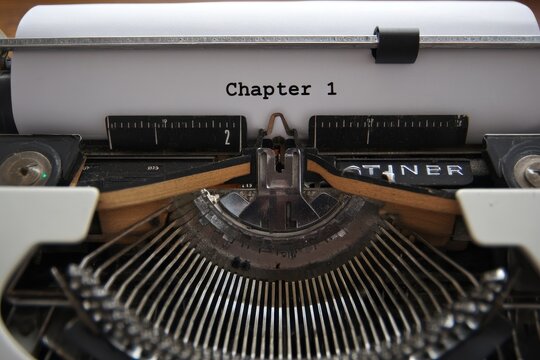 Vintage Typewriter Depicting 'Chapter One' on Aged Paper with Nostalgic Letters