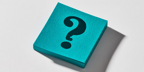 Poster - Stack of teal textured paper with question mark cutout, symbolizing inquiry, uncertainty, or problem-solving