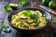© MdJilu - Zucchini and Basil Pasta in a Dark Bowl