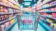 © Juan - Shopping cart in colorful aisle blur for consumerism retail market motion store grocery commerce lifestyle