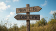 © Henry - A wooden signpost points to 'New Life' and 'Old Life,' symbolizing choices and transitions in life amidst a natural backdrop.