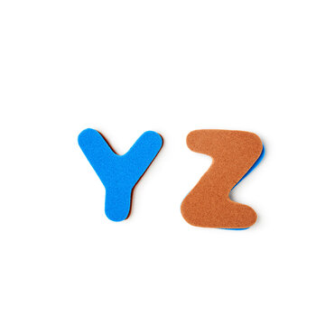 Colorful foam letters Y Z alphabet isolated on white background. Clipping path.