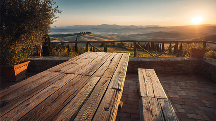 Poster - Empty wooden table with a view of the early morning sun over a tuscan vineyard