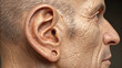 © Waris - Body parts. Closeup of male ear.
