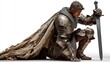 © Rincon Studio - A medieval knight in armor kneeling with a sword ready for battle historical reenactment fan