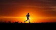 © singgih - Silhouette of Person Running at Sunset