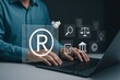 © ShanzyAiStudio - Intellectual Property Protection Concept with Registered Trademark Symbol and Legal Icons | Businessman Securing Copyright, Patents and Brand Identity for Business Growth