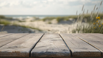 Wall Mural - rustic wooden table stands ready for product display, set against serene beach backdrop with soft sand and gentle grass swaying in breeze, evoking peaceful summer vibe