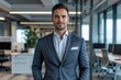 © Michael - Confident Businessman in Suit Posing in Modern Office Setting