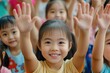 © Mykola - China Student. Hands Raised in Participation - Youth Volunteer and Children Uprising