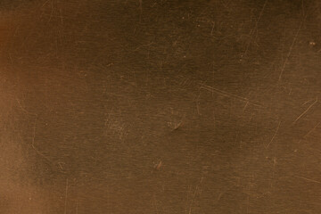 Poster - High-resolution photo of a scratched brown metal surface. Perfect for backgrounds and textures.