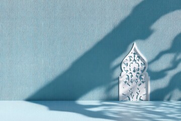 Wall Mural - Abstract light blue background with beautiful shadow of Muslim ornament on the wall